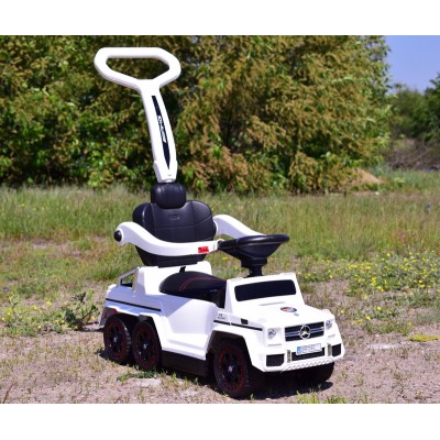 JEŹDZIK NA AKUMULATOR, PCHACZ, ODPYCHACZ MERCEDES G 63 AMG 6X6, MIĘKKIE KOŁA,  DASZEK , STEROWANIE RĄCZKĄ /1838 LONG